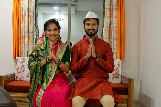 Smiling Indian couple at home